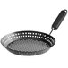 A black round metal Outset grill skillet with holes and a removable handle.