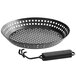 A black round metal Outset grill skillet with holes.