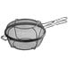a close-up of a black wire mesh strainer