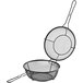 An Outset black wire grill basket with a handle.