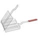 An Outset chrome wire grill basket with a wooden handle.