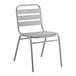 A grey metal Lancaster Table & Seating chair with metal legs.