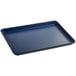 A dark blue non-stick Baker's Mark aluminum sheet pan with a wire rim.