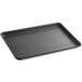 A black Baker's Mark non-stick rimmed sheet pan.