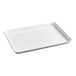A white rectangular non-stick aluminum bun or sheet pan with a wire-reinforced rim.