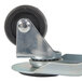 A metal wheel with a black rubber wheel and a black knob.