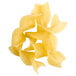 A pile of Regal medium egg noodles on a white background.