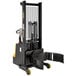 A black and yellow Vestil drum stacker with a yellow handle.