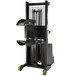 A black and yellow Vestil drum stacker machine.