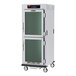 A Metro C5 holding cabinet with clear Dutch doors and wire slides.