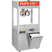 A Cretors floor model popcorn machine with a bucket and a lid.