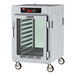 A white Metro C5 holding cabinet with a clear glass door.