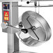 A Cretors popcorn popper machine with a round metal bowl on top.