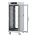 A large metal Metro holding cabinet with a clear door and chrome slides.