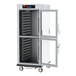 A grey Metro C5 holding cabinet with clear glass Dutch doors.