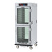 A Metro C5 full size insulated holding cabinet with clear Dutch doors.
