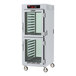 A white Metro C5 low wattage holding cabinet with clear Dutch doors.