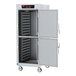 A grey metal Metro C5 holding cabinet with two open doors.
