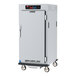 A white Metro C5 holding cabinet with a solid door open.