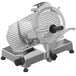 A silver Sirman Smart meat slicer on a stand with black handles.