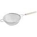 A Vollrath stainless steel strainer with a wood handle.