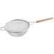 A Vollrath stainless steel double mesh strainer with a wood handle.