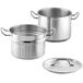 A Vigor stainless steel pasta cooker with a lid and strainer.