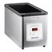 A stainless steel digital food warmer with a rectangular opening and control panel on the front.