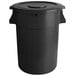 A black round ingredient storage bin with a lid.