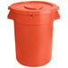An orange plastic round ingredient storage bin with lid.