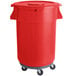 A red plastic ingredient storage bin with wheels and a lid.