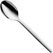 A WMF stainless steel serving spoon with a silver handle.