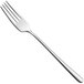 A WMF Scala stainless steel dessert fork with a white handle.