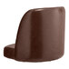 A brown vinyl bucket seat for a chair with a backrest.