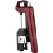 A red wine bottle being preserved with a red and black Coravin Timeless Six wine preservation system.