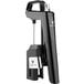 A black and silver Coravin wine preservation system with a bottle.