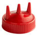 A Vollrath red plastic cap with three pointy spikes.