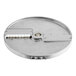 A round metal julienne disc attachment for a food processor, designed for slicing ingredients into thin strips.