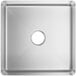 A white close-up of a Regency stainless steel square sink bowl with a circle in the middle.