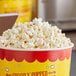 A bucket of freshly popped Pop Weaver gold butterfly popcorn.