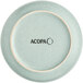 An Acopa Pangea Harbor Blue porcelain saucer with a close up of the plate.