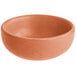 An Acopa Terra Cotta ramekin with a brown rim.