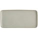 A white rectangular porcelain platter with a white border.