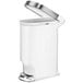 A white simplehuman slim step-on trash can with the lid open.