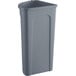 A Lavex 21 gallon gray plastic corner round trash can with a lid.