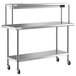 A stainless steel Regency expeditor table with shelves on wheels.