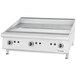 A close-up of a U.S. Range 36" chrome plated countertop griddle.