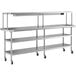A Regency stainless steel work table with shelves on wheels.