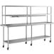 A stainless steel Regency work table with double overshelf and undershelf on wheels.