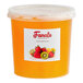 A white plastic container of Fanale passion fruit popping boba with orange liquid inside.